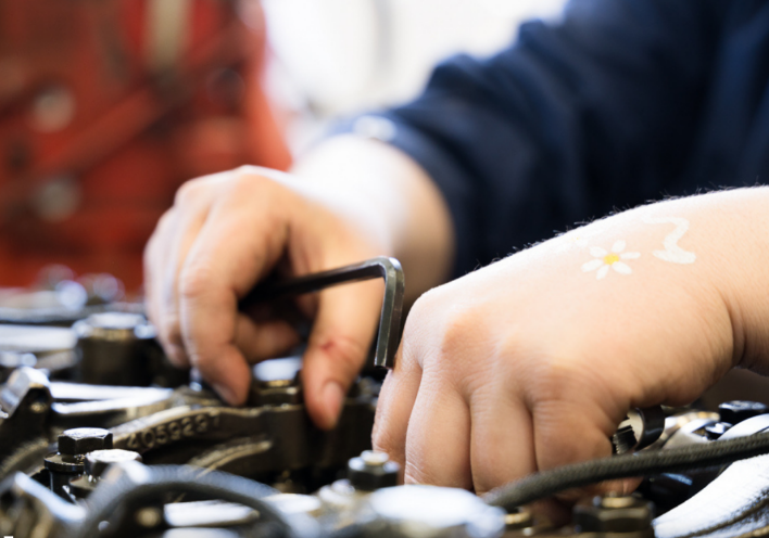 Hands Repairing Motor